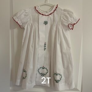 2T 
Smocked white dress with wreath/holly